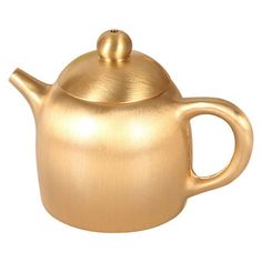 a gold colored tea pot with a lid