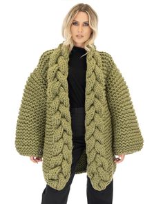 Think about the coziest, oversized, long, side-cut knitted coat and dream on! Our “Coat” is the ultimate outerwear obsession that will definitely keep the cold out and turn your style up for the most eye-catching looks. Keep things relaxed and casual during autumn and winter. This is a 100% Handmade piece in Greece. Please note that this unique item is being knitted by order (after you place your order) and it is a one-size, oversized, heavy knit. Our models height is 1,70cm in case you want to Winter Cable Knit Outerwear One Size, Oversized Merino Wool Outerwear For Fall, Knitted Outerwear For Cold Weather, Cozy Knit Long Coat, Oversized Casual Merino Wool Outerwear, Casual Oversized Merino Wool Outerwear, Cable Knit Outerwear In One Size, Oversized Soft Knit Outerwear, Cable Knit Long Outerwear For Cold Weather