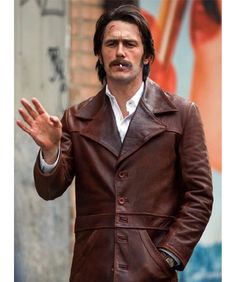 James Franco The Deuce Vincent Martino Leather Coat James Franco gives a remarkable dual performance as twin brothers Vincent and Frankie Martino in HBO's popular series "The Deuce." Set against the gritty backdrop of 1970s New York City, it explores the lives and struggles of those caught up in its expanding sex industry at that time. Franco plays Vincent Martino - a bar manager turned frontman for mobster Vincent DiNozzo who becomes embroiled in its turmoil - perfectly illustrating this problematic character caught between drastic changes during that period.  Franco delivers an interesting performance as Vincent, depicting his internal conflict while steering the dangerous and seductive worlds of the sex trade, organized crime, and nightlife scene. The series is popular for its vivid ill 70s Leather Jacket, Captain America Jacket, The Deuce, Celebrities Leather Jacket, Shearling Jacket Women, Brown Leather Coat, Custom Leather Jackets, Cafe Racer Jacket, Best Leather Jackets