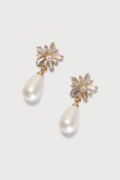 two pairs of earrings with white pearls and crystal stones on the front, one is gold