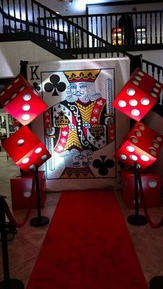 a red carpeted area with dice lights on it