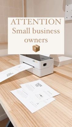 a small business owner's office desk with the words attention small business owners on it