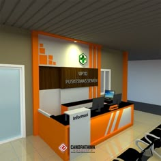 an orange and white reception desk with laptops on it