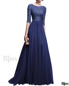 a woman in a long blue dress with sleeves and laces on the top, wearing a