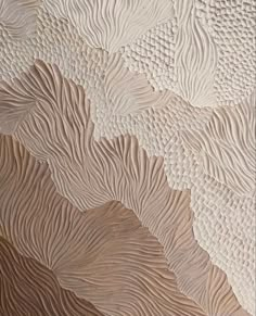 an abstract wallpaper design with wavy lines and curves in beige, brown and white