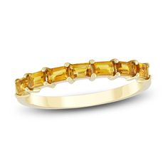 Make your celebration sparkle with this sunny citrine stackable ring. 10K yellow gold Seven baguette-cut natural citrines—the birthstone of November—are set east-to-west Mix and match with other gemstone rings as a way to honor loved ones' birthdays (sold separately) Yellow Gold Citrine Baguette Cut Ring, Yellow Gold Citrine Rings In Baguette Cut, Gold Citrine Baguette Cut Ring, Yellow Gold Baguette Gemstone Jewelry, Yellow Gold Birthstone Ring With Baguette Cut, 14k Yellow Gold Topaz Ring With Baguette Cut, Yellow Gold Baguette Cut Birthstone Ring, Yellow Gemstone Jewelry, November Birthstone Ring