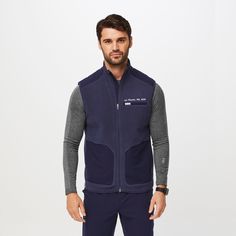 Official FIGS® Outerwear. Get Free Shipping On Orders $50+! | FIGS Mens Navy On-Shift™ - Fleece Vest Fleece Vest, Mens Navy, Range Of Motion, Recycled Fabric, Anti Wrinkle, Fig, Vest Jacket, Rib Knit, Motion