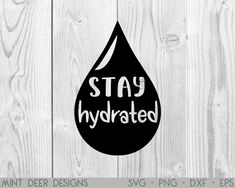 a black and white water drop with the words stay hydrated on it, next to a