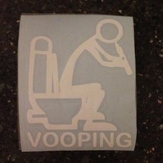 a sticker that says, vooping on the side of a toilet