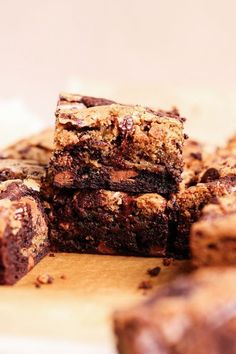 chocolate brownies stacked on top of each other with one bite taken out of it