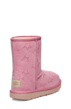 Metallic stars scatter on the suede upper of this cozy, kid-size boot lined with a UGGplush, a moisture-wicking textile made from a wool-rich blend but crafted to feel and wear like genuine shearling. Leather upper/UGGplush wool-blend lining/synthetic sole Imported Hello Kitty Decorations, Star Boots, Pink Iridescent, Outfit Pieces, Christmas Money, High School Outfits, Kids Uggs, Amazing Pics, Girly Shoes