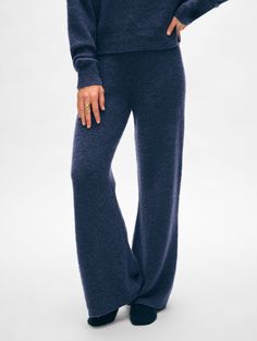 As soft and cozy as it looks, this pant is made of our newest Cashmere Bouclé blend, we masterfully combined the loftiness of merino wool bouclé yarn with the softness of cashmere and enhanced it with a hint of stretch to create our plushest loungewear yet. The wide legs allow for ease of movement, while a flattering waistband ensures comfortable wear. Style it with the matching sweatshirt—it’ll be the best set you’ll ever own. Details Inseam 28". The model is 5'8" and is wearing a size small. 5 Cashmere Travel Wrap, Boucle Yarn, Matching Sweatshirts, Wide Leg Pant, Cardigan Top, Wrap Sweater, Sweater Sale, Knitwear Cardigan, Wide Legs