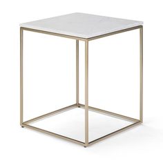 a white marble top side table with gold metal frame and square base, viewed from the front