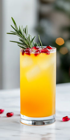 Winter Tequila Sunset Recipe Tequila Sunset Recipe, Tequila Sunset, Creamy Eggnog, White Cranberry Juice, Paloma Cocktail, Winter Celebration, Cranberry Cocktail, Sugared Cranberries, Best Cocktail Recipes