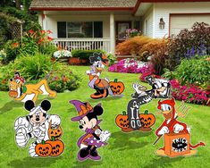 mickey mouse halloween yard decorations in front of a house