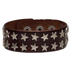 Give your style an attitude with this star studded bracelet. Bracelet is adjustable at 5-1/2, 6-1/2 and 7 inches, and is ready to wear. Colors, shapes and sizes may vary in each lot. Star Stud Bracelet, Bracelets Grunge, Leather Studded Bracelet, Adjustable Studded Leather Bracelet In Punk Style, Beaded Swimwear, Cheap Star-shaped Metal Bracelets, Cheap Metal Star-shaped Bracelets, Star Studded Belt, Leather Dye