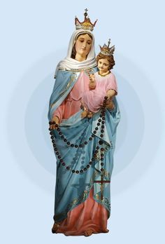 a statue of the virgin mary holding a child in her arms and wearing a crown