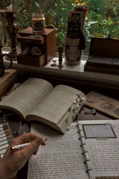 an open book sitting on top of a desk