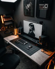 a desktop computer sitting on top of a desk next to a keyboard and mouse pad