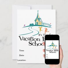 a person holding an iphone next to a vacation home school brochure