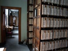 a room filled with lots of wooden boxes