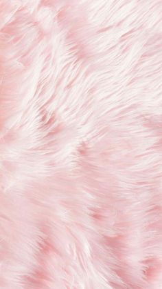 a pink fur texture is shown in this image