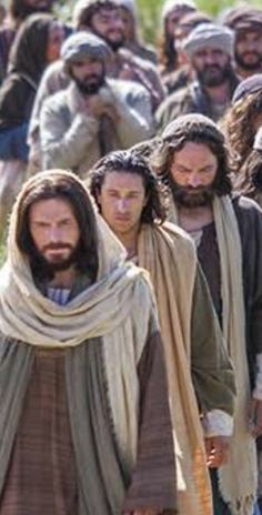 jesus walking through the field with other men