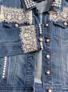 a denim jacket with lace and pearls on it