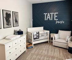 a baby's room with blue walls and white furniture