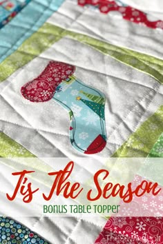 it's the season table topper with text overlay that reads, tis the season