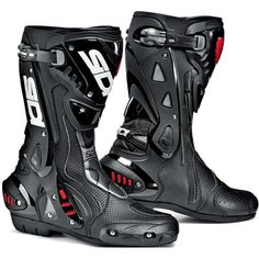 a pair of black and red motorcycle boots