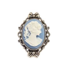 A classic Victorian style cameo of a thoughtful looking lady is set into this lovely, ornate ring. The sides of the ring are very attractively detailed with a delicate little bow at the top and bottom. The cameo measure 18 x 13 mm.The silver plated ring is adjustable so one size fits all. Comfortable and easy to wear.This ring is also available in black. ***********************************************************Gift wrappingAll jewellery is beautifully presented and ready for gift giving, sprin Goth Steampunk, Ornate Ring, Steampunk Rings, Steampunk Wedding, Ring Elegant, Elegant Gothic, Cameo Jewelry, Gothic Steampunk, Gothic Rings