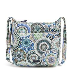 The ultimate in hands-free organization, this clever crossbody features several pockets. Outlet Exclusive Exterior features a zip pocket Interior features a zip pocket and two slip pockets Zip closure. Dimensions: 11. 0" w x 11. 0" h x 3. 0" d Handle/Strap Adjustable straps 56. 0" Weight: 0. 64 lb Vera Bradley Outlet Women's XL Crossbody Bag in Sketched Medallion Work Backpack, Medium Backpack, Belt Purse, Crossbody Messenger Bag, Toiletry Bag Travel, Small Backpack, Mini Purse, Backpack Purse, Cotton Bag