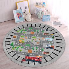 a child's play area with cars and trucks on the rug in front of it