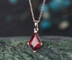 ***This stunning red ruby necklace features a 14k rose gold chain and kite-cut red ruby stone, which is minimalist and stylish. Perfect for the modern woman looking for a unique and elegant daily wear necklace***- Metal: Solid gold(9K/14K/18K white/yellow/rose gold),925 sterling silver, platinum available- Main Stone: 7x10mm kite cut lab red ruby- Chain: 16+2 inches. The chain can be adjustable to 18 Inches.- Can be personalized: Yes Gold Ruby Jewelry, Ruby Amulet, Daily Wear Necklace, Red Ruby Necklace, Trillion Engagement Ring, Ruby Chain, Red Pendant Necklace, Moissanite Ring Set, Rutilated Quartz Ring