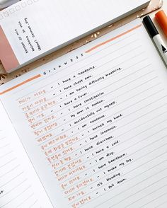 an open notebook with some writing on it