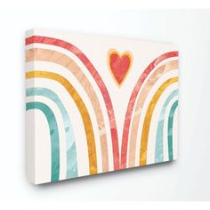 an abstract painting with rainbows and a heart on the top is featured against a white background