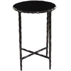 a round table with black glass top and metal frame, on an isolated white background