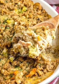 a casserole dish filled with meat and vegetables