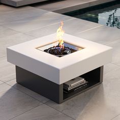 a fire pit sitting on top of a tiled floor