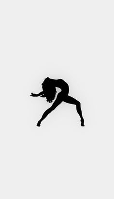 a woman is jumping in the air with her arms out and legs spread wide, silhouetted against a white background