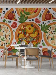 a dining room with a large mural on the wall next to a table and chairs