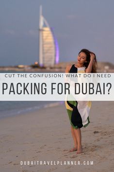 a woman standing on top of a sandy beach next to the ocean with text overlay that reads, cut the confusion what do i need packing for dubai?