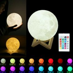 the moon lamp is lit up in different colors