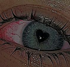 an eye with blood on it is shown in this close up photo from the tv series