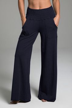 Why We Love This: These effortlessly boho chic wide leg yoga pants have pockets and a smocked waistband for practical comfort and style.Features: KiraGrace Sustainable French Terry Feels luxuriously soft and cozy Mid-rise, 32" inseam Made in U.S.A. of imported fabric  Waist: High-Waisted (10" Rise) Inseam: 32" inseam, easily modified Leg Shape: Flowy wide leg Sizing: True to size Compression: Flowy- No compression Model, Kori, is 5'10" 135 lbs., wearing a size small grey yoga sweats, Yoga Sweats Boho Yoga Pants, Yoga Bottoms, Stylish Loungewear, Leg Yoga, 135 Lbs, Boho Yoga, Cozy Boho, Cozy Tops