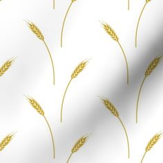 a white and gold wallpaper with wheat stalks on it