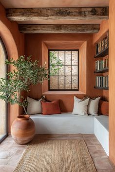 Beautiful Examples Of Modern Spanish Mediterranean Homes - Edward George Mediterranean Hallway, Arched Alcove, Terracotta Walls, Vase Plant, Built In Seating