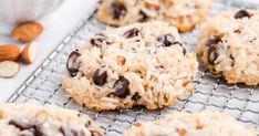 cookies with chocolate chips and almonds on a cooling rack