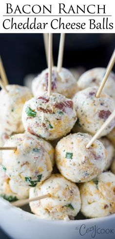 bacon ranch cheddar cheese balls in a white bowl with toothpicks on top